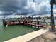 This is a charming dock offers residents direct access to the water, perfect for boating and enjoying waterfront living at 6201 2Nd E St # 73, St Pete Beach, FL 33706