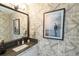 Modern bathroom with patterned wallpaper and updated fixtures at 100 1St N Ave # 2205, St Petersburg, FL 33701