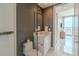 Modern bathroom with white vanity, toilet and a glass shower at 100 1St N Ave # 2205, St Petersburg, FL 33701