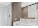 Contemporary bathroom features a large mirror and a walk-in shower at 100 1St N Ave # 2205, St Petersburg, FL 33701