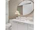 Elegant bathroom with large mirror and modern vanity at 100 1St N Ave # 2205, St Petersburg, FL 33701