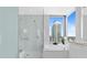 Spa-like bathroom with a walk-in shower and soaking tub at 100 1St N Ave # 2205, St Petersburg, FL 33701