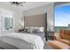 Elegant bedroom with a comfortable bed and city view at 100 1St N Ave # 2205, St Petersburg, FL 33701