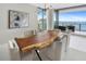 Elegant dining room featuring a live-edge table and modern lighting at 100 1St N Ave # 2205, St Petersburg, FL 33701