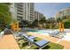 Resort-style pool with plenty of lounge chairs at 100 1St N Ave # 2205, St Petersburg, FL 33701