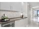 Modern wet bar with wine cooler and sleek design at 100 1St N Ave # 2205, St Petersburg, FL 33701