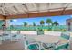 Outdoor patio furniture with waterfront views at 1 Key Capri # 102E, Treasure Island, FL 33706