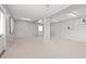 Empty office space with grey walls and carpet at 800 Pasadena S Ave, St Petersburg, FL 33707