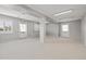 Empty office space with grey walls and carpet at 800 Pasadena S Ave, St Petersburg, FL 33707