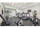 Well-equipped gym featuring modern treadmills, elliptical machines, and weight training equipment at 13856 Royston Bnd, Hudson, FL 34669