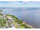 Stunning waterfront property with panoramic views and private beach access at 131 Pennsylvania Ave, Palm Harbor, FL 34683