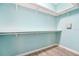 Large walk-in closet with ample shelving and hanging space at 131 Pennsylvania Ave, Palm Harbor, FL 34683