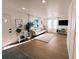 Light-filled living room featuring hardwood floors and white walls at 811 40Th S Ave, St Petersburg, FL 33705