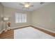 Spacious bedroom with neutral walls and a ceiling fan at 1733 Split Fork Dr, Oldsmar, FL 34677