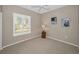 Serene bedroom with plantation shutters and artwork at 1733 Split Fork Dr, Oldsmar, FL 34677