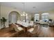 Elegant dining room features a marble table and six chairs at 1733 Split Fork Dr, Oldsmar, FL 34677