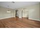 Bright dining room with hardwood floors and neutral walls at 1733 Split Fork Dr, Oldsmar, FL 34677