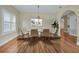 Bright dining area with a modern table and six chairs at 1733 Split Fork Dr, Oldsmar, FL 34677