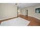 Light and airy living room with wood flooring and neutral tones at 1733 Split Fork Dr, Oldsmar, FL 34677