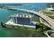 Aerial view of waterfront building, pool, and marina at 100 Pierce St # 703, Clearwater, FL 33756