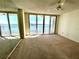 Bedroom with water views and mirrored walls at 100 Pierce St # 703, Clearwater, FL 33756