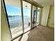 Bedroom with balcony and water views at 100 Pierce St # 703, Clearwater, FL 33756