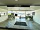Glass doors to building entrance with marina view at 100 Pierce St # 703, Clearwater, FL 33756