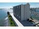 Exterior view of a waterfront building with balconies at 100 Pierce St # 703, Clearwater, FL 33756