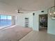 Living room with water views and tropical wall mural at 100 Pierce St # 703, Clearwater, FL 33756