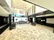 Elegant lobby with marble floors and modern chandelier at 100 Pierce St # 703, Clearwater, FL 33756