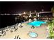 Night view of resort-style pool and spa with city views at 100 Pierce St # 703, Clearwater, FL 33756