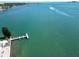 Aerial view of a private dock on calm water at 100 Pierce St # 703, Clearwater, FL 33756