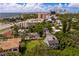 Aerial view of a house and surrounding neighborhood, showcasing the property's location and proximity to the water at 716 14Th Ne Ave, St Petersburg, FL 33701