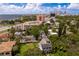 Aerial view of a house and surrounding neighborhood, showcasing the property's location and proximity to the water at 716 14Th Ne Ave, St Petersburg, FL 33701