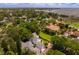 Aerial view showcasing a house's position within a neighborhood, near water and cityscape at 716 14Th Ne Ave, St Petersburg, FL 33701