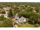 Large home on a tree-lined street, aerial view at 716 14Th Ne Ave, St Petersburg, FL 33701