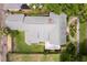 An overhead view of the house, highlighting its roof, backyard, and landscaping at 716 14Th Ne Ave, St Petersburg, FL 33701
