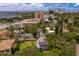 Aerial view of a house and surrounding neighborhood, showcasing the property's location and proximity to the water at 716 14Th Ne Ave, St Petersburg, FL 33701