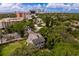 Two-story home nestled among trees, aerial view at 716 14Th Ne Ave, St Petersburg, FL 33701