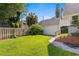 Large backyard with detached garage and lush lawn at 716 14Th Ne Ave, St Petersburg, FL 33701