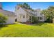 Spacious backyard with detached garage and lush lawn at 716 14Th Ne Ave, St Petersburg, FL 33701