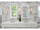 Elegant bathroom with double vanity and marble finishes at 716 14Th Ne Ave, St Petersburg, FL 33701