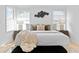 Spacious bedroom with a king-size bed and ample natural light at 716 14Th Ne Ave, St Petersburg, FL 33701