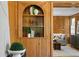 Elegant built-in shelving unit with arched top and decorative objects at 716 14Th Ne Ave, St Petersburg, FL 33701