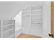 Large walk-in closet with ample shelving and hanging space at 716 14Th Ne Ave, St Petersburg, FL 33701