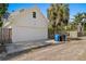 Detached garage with white door and brick driveway at 716 14Th Ne Ave, St Petersburg, FL 33701