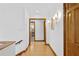 Bright hallway with hardwood floors and access to other rooms at 716 14Th Ne Ave, St Petersburg, FL 33701