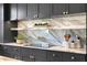Kitchen backsplash with marble and wood shelving at 716 14Th Ne Ave, St Petersburg, FL 33701