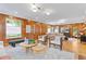 Living room with wood paneled walls and hardwood floors at 716 14Th Ne Ave, St Petersburg, FL 33701