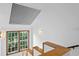 Bright stairwell with unique light fixtures and wood accents at 716 14Th Ne Ave, St Petersburg, FL 33701